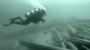 Diving to retrieve sunken timber from the log drive