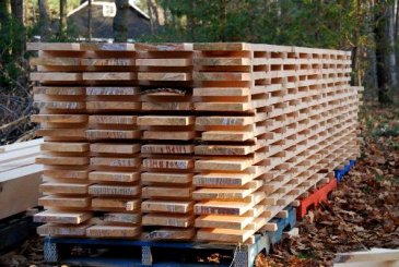 Boards stacked for air drying