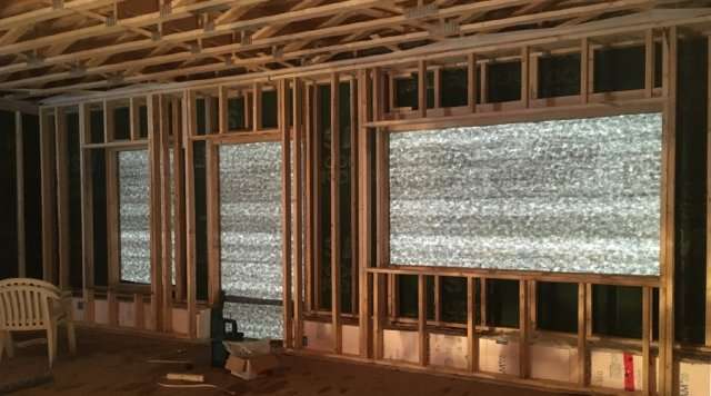 Construction d'un mur à double ossature pour une conception de Maison Passive