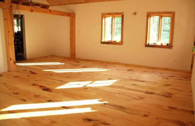Finished studio using reclaimed materials and tree milled on site