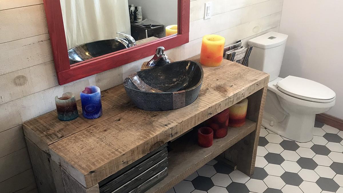 Recycled barn beams and a refinished clawfoot bathtub