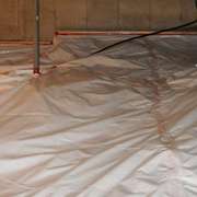 Crawlspace radon barrier installation for radon mitigation