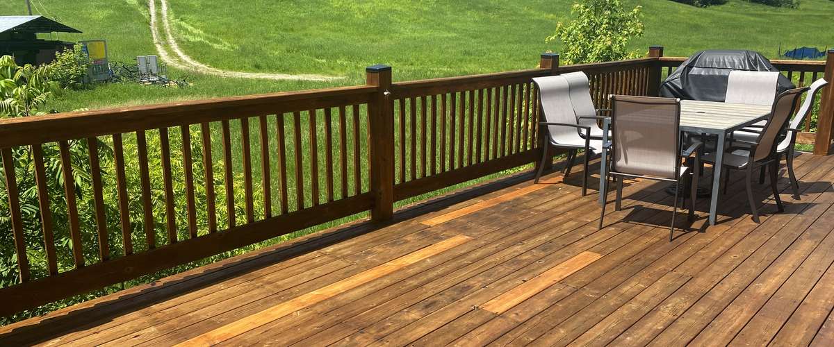Freshly Stained Cedar Wood Deck after Renovating old Decking to Look Like New