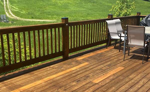 Freshly Stained Cedar Wood Deck after Renovating old Decking to Look Like New