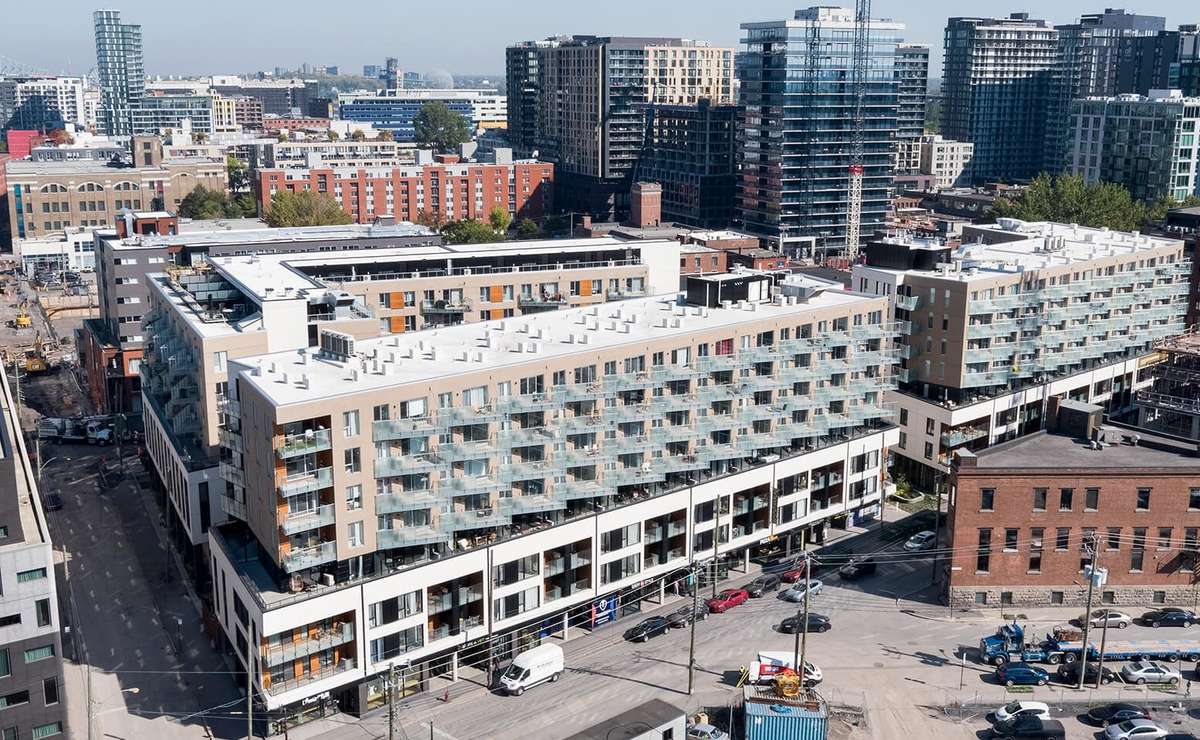 Mid-rise construction with reduced embodied carbon wood v concrete