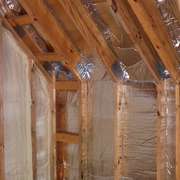 Radiant barriers on ceilings and walls can reduce heating and cooling costs