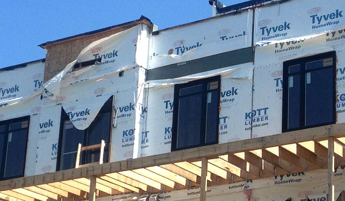 Tyvek home wrap left exposed to wind and UV rays
