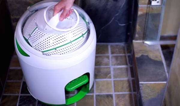 Manual powered foot pedal washing machine for doing laundry off-grid