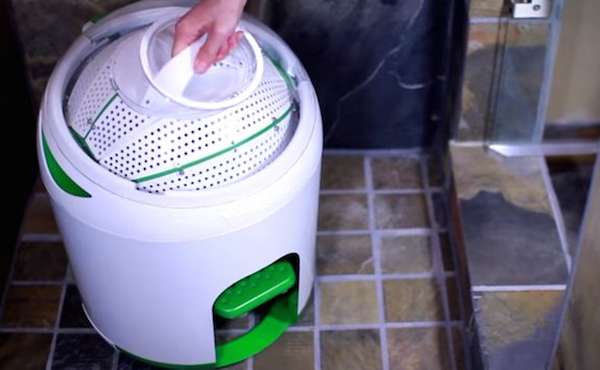 Manual powered foot pedal washing machine for doing laundry off-grid