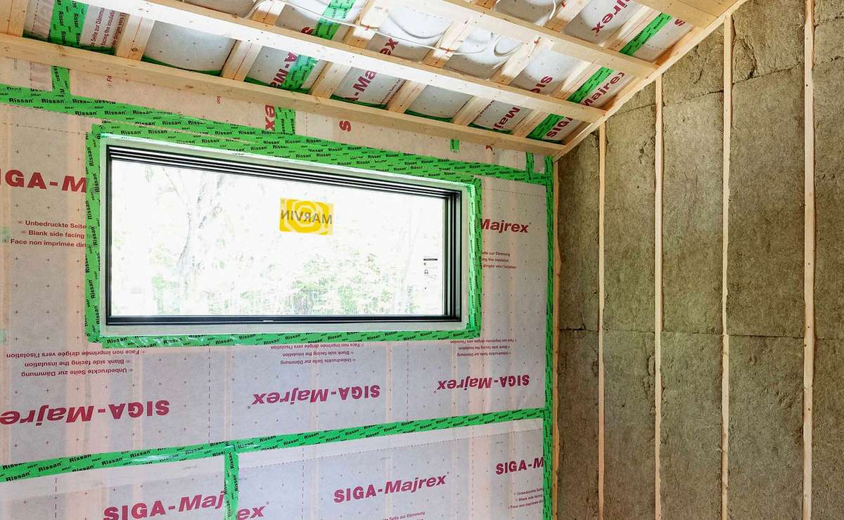 High-Performance Building Tape Applied to a Wall Sheathing