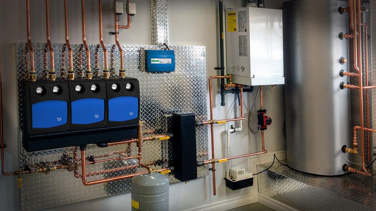 Mechanical room with radiant floor boiler.