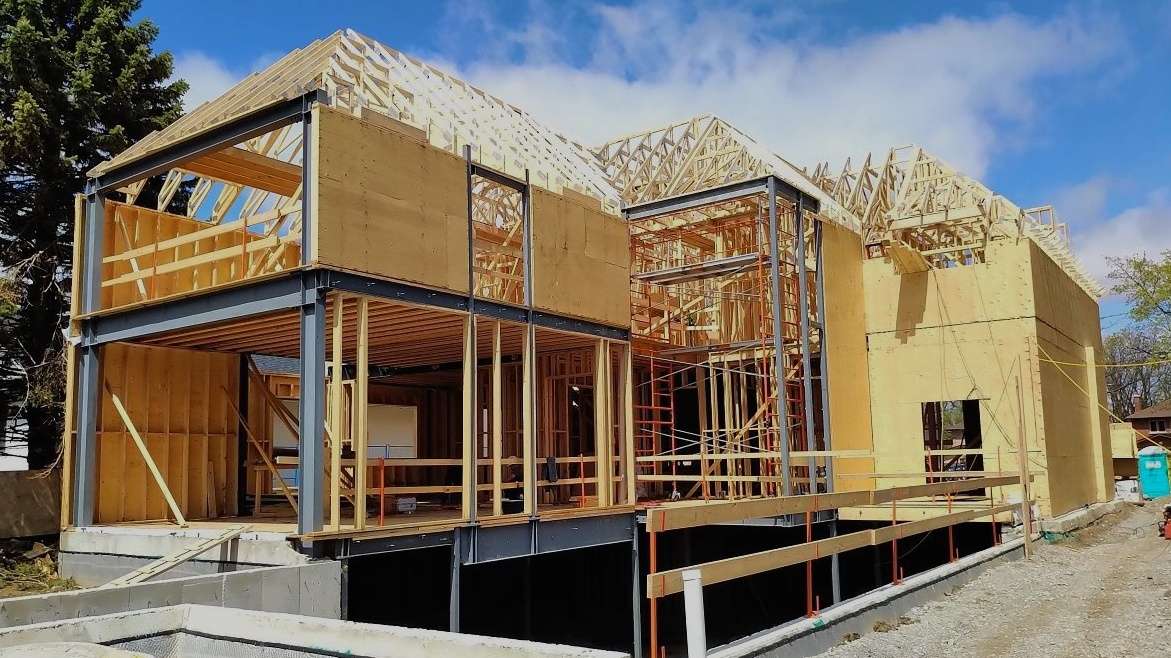 Home under construction by a design build firm