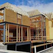 Home under construction by a design build firm