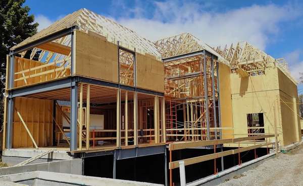 Home under construction by a design build firm