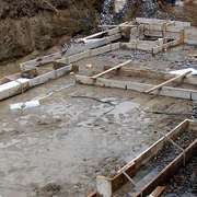 Slab on grade or a foundation and basement?