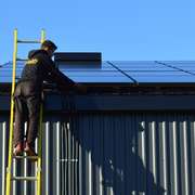 Rooftop Solar Panel Installation on a Modern Residential Home © Solify Solar