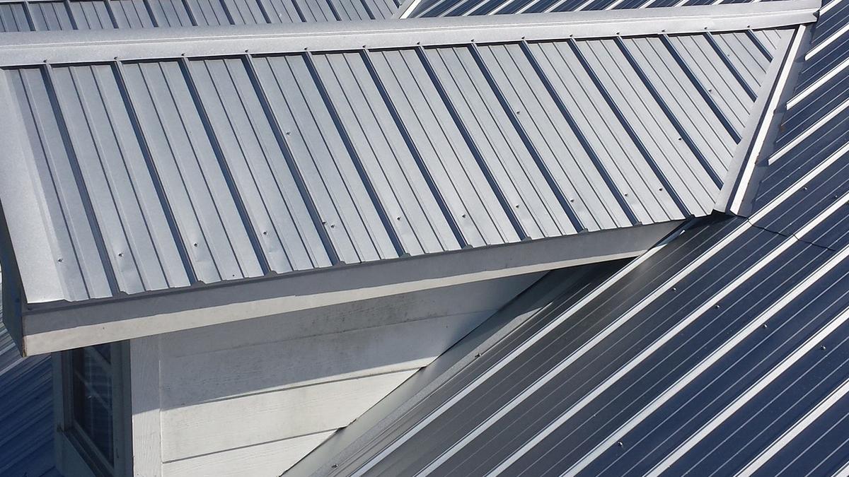 Metal roof with solar panels