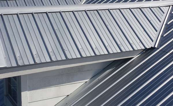 Metal roof with solar panels