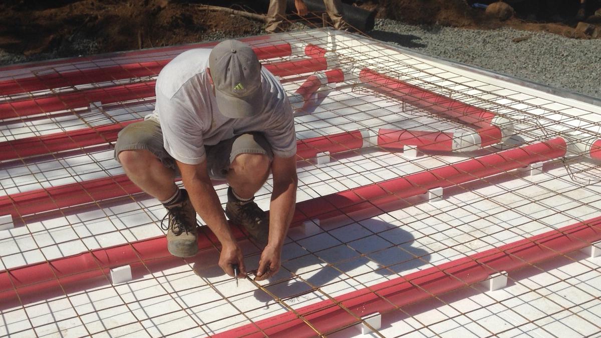 Plancher radiant isolé en coffrage ICF chauffé à l’air