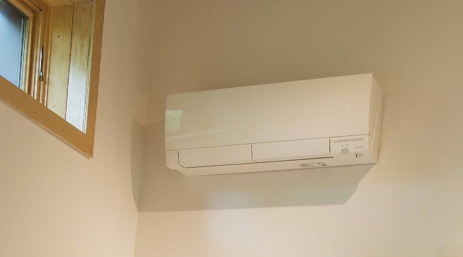 Ductless mini-split air source heat pump installed in a LEED certified PH Home