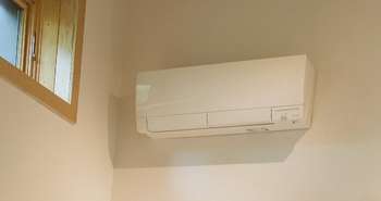 Ductless mini-split air source heat pump installed in a LEED certified PH Home