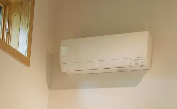 Ductless mini-split air source heat pump installed in a LEED certified PH Home