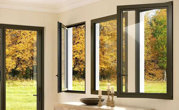 Tilt and turn window in a modern home, shown in both tilt and turn positions.