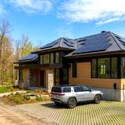 A home with solar panels, heat pump and EV charging