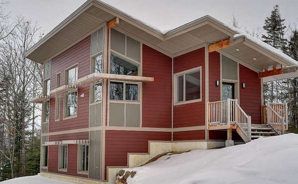 Passively-heated off-grid LEED house in Low, Quebec