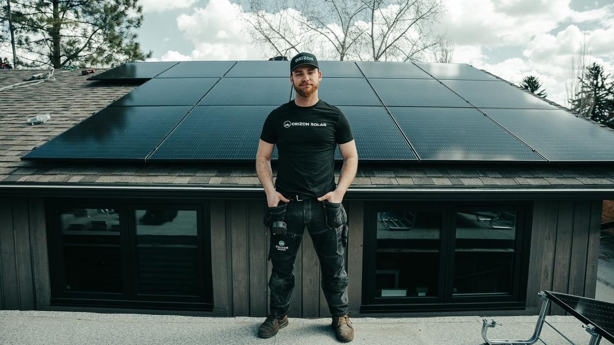 Residential roof in Calgary with an extensive grid-tied solar panel array