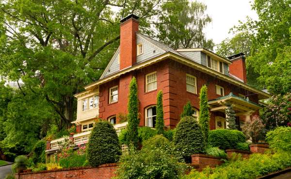 An Old Brick Faced Home Tricky To Air Seal - Image © Blackstone Edge Studios
