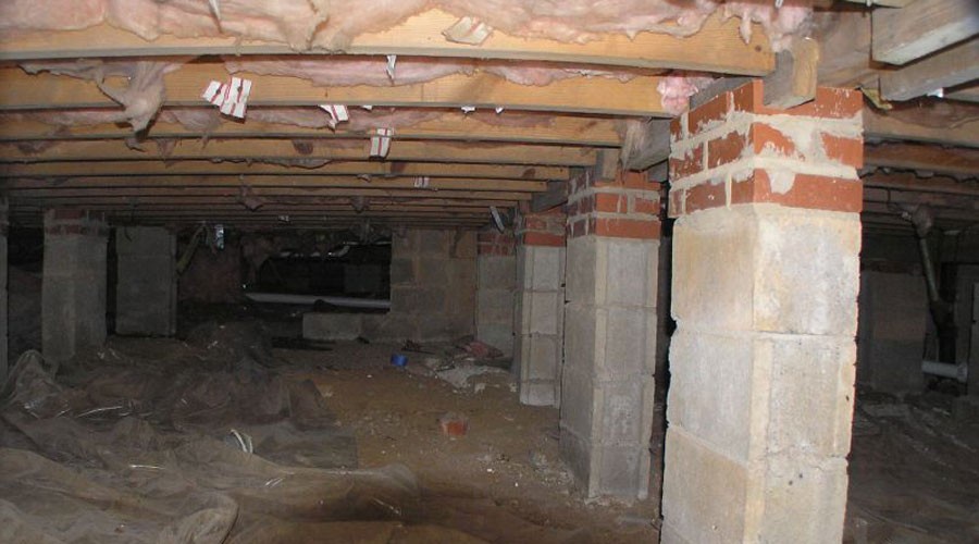 Attic / Crawlspace Under Roof With Insulation Foam and Rafters Taken During  Florida Home Inspection Stock Photo