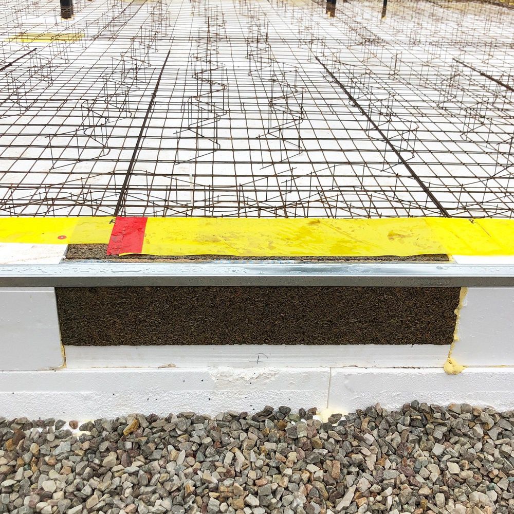 Insulated door threshold step to stop coldbridging of concrete slabon