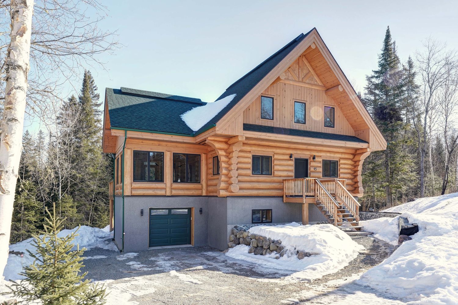 House Exterior from a Log Houses project near Montreal (Greater Montreal) by Harkins inc. - Bois rond & Charpenterie