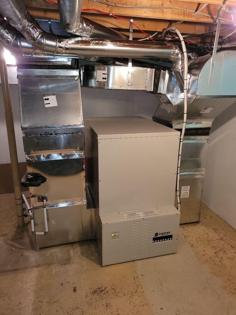 Instalaciones mecánicas de un proyecto de tipo Calefaccion con almacenamiento térmico cerca de Montreal (Gran Montreal) por Climatisation GéoServices