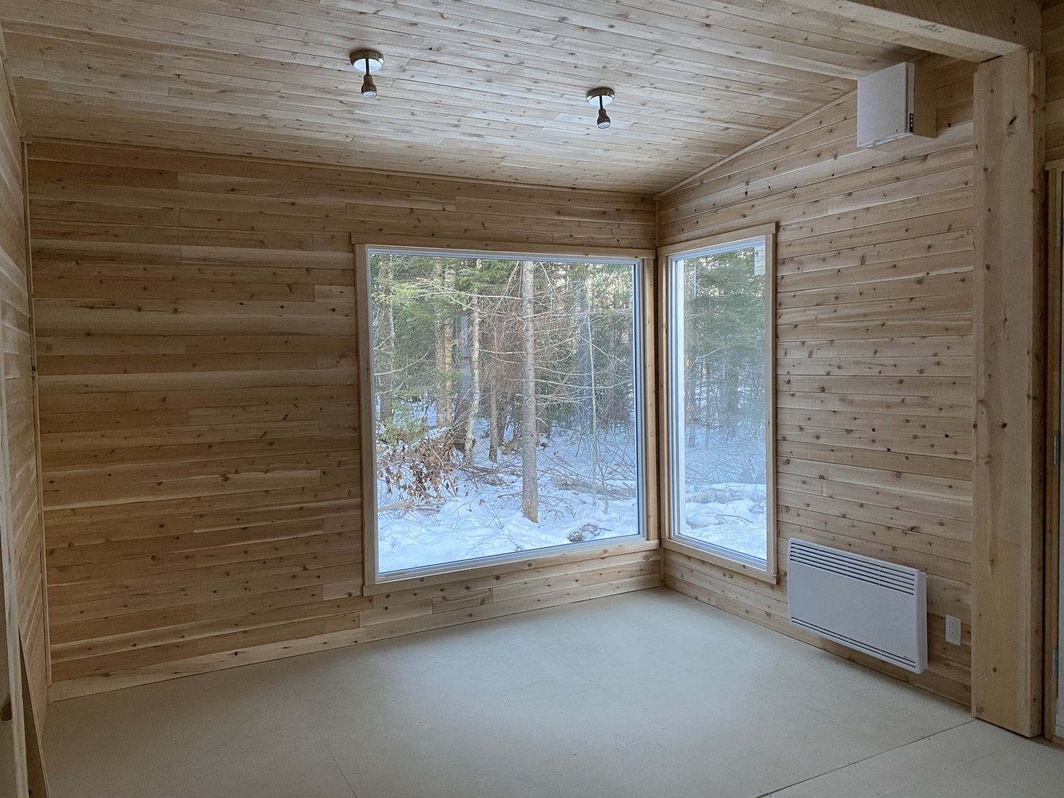 Family Room from a Tiny Houses project near Quebec City - Levis by CAMM Construction