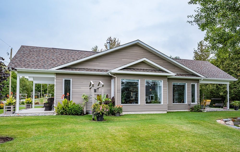 House Exterior from a Windows project near Abitibi-Témiscamingue by ARTIK Portes et Fenêtres