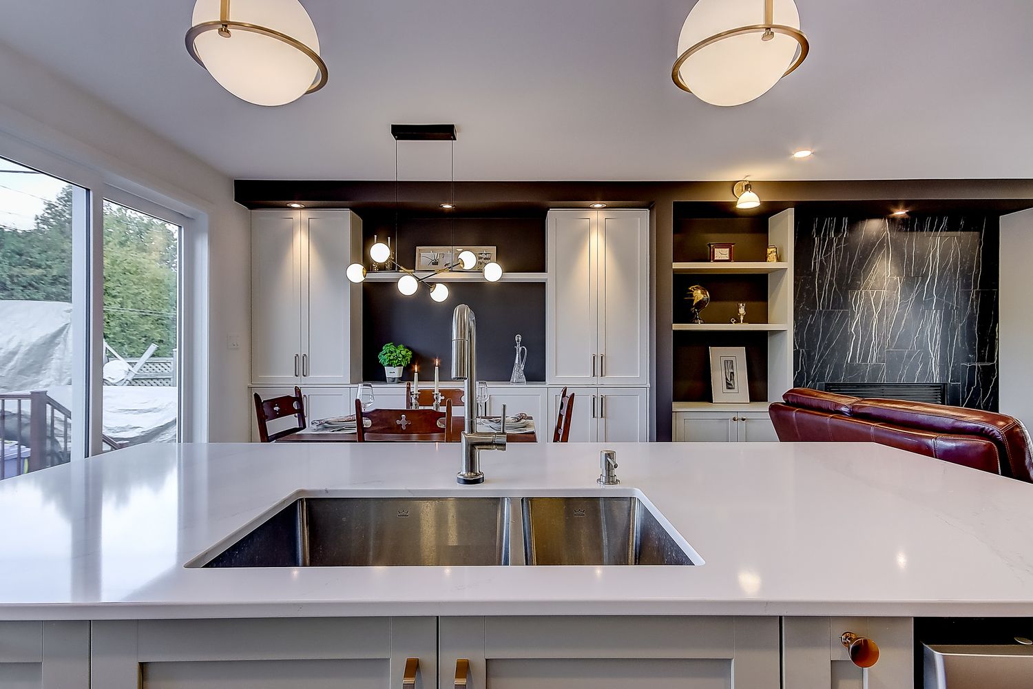 Kitchen from a Single family homes project near Saint-Jean-sur-Richelieu (Montérégie) by Mandrée Design