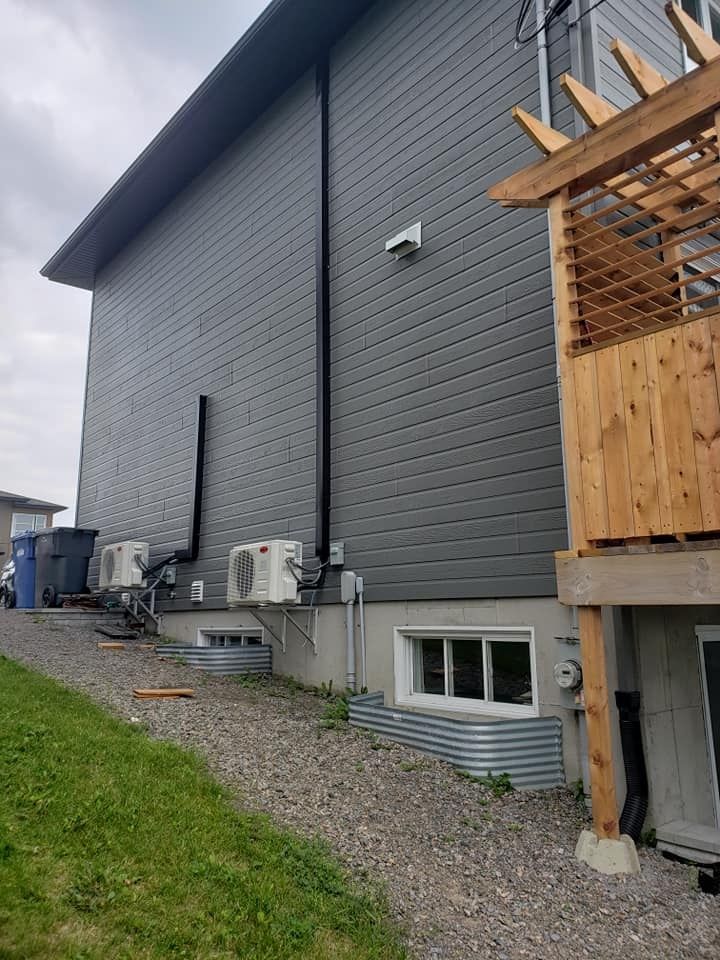 Finition extérieur d'un projet de Thermopompes près de Trois-Rivières/Shawinigan (Mauricie) de Guillemette Energies