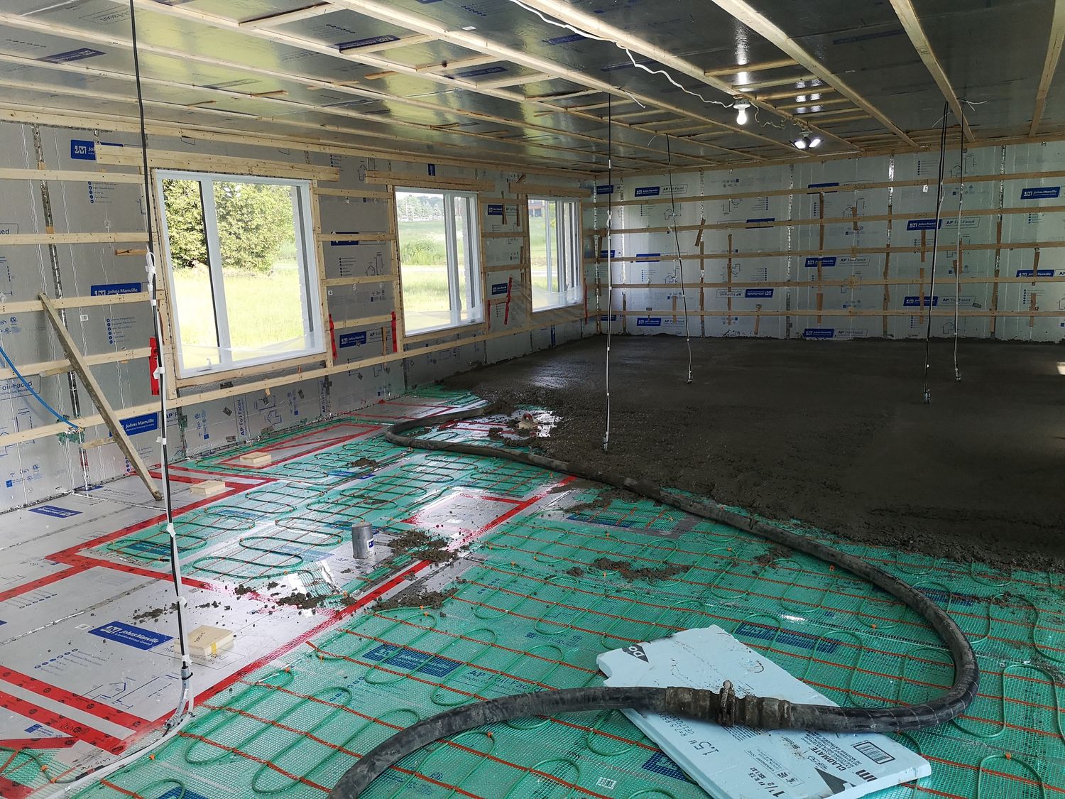Construcción de interiores de casas de un proyecto de tipo Calefacción eléctrica por piso radiante cerca de Granby - Bromont - Cowansville por Électrem Énergie INC