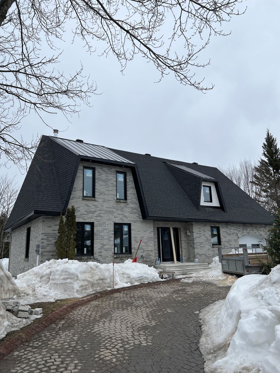 Finition extérieur d'un projet de Maisons unifamiliales près de Québec/Lévis (Ville de Québec) de Groupe Habitech