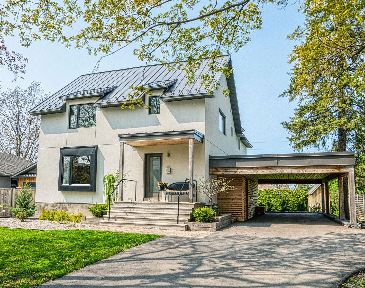 House Exterior from a Single family homes project near Ottawa by Lara McKendrick Architecture Inc