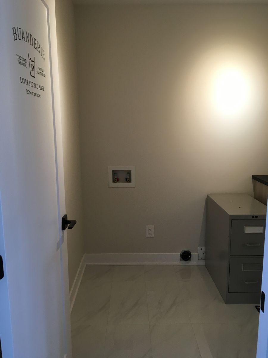 Lavandería de un proyecto de tipo Viviendas unifamiliares cerca de Granby - Bromont - Cowansville por GAÉTAN SIROIS CONSTRUCTION INC