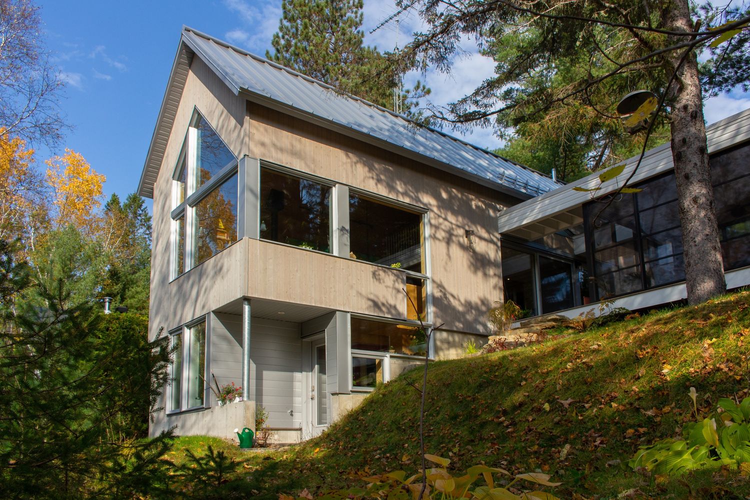 Backyard from a Regional & Rural Planning project near Joliette (Lanaudière) by Atelier abcdg