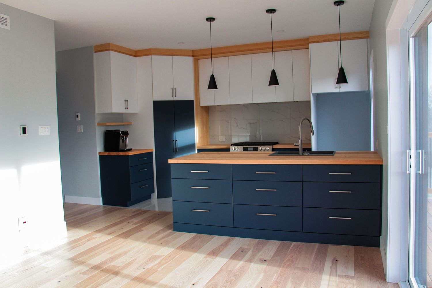 Cuisine d'un projet de Maisons unifamiliales près de Rimouski (Bas-Saint-Laurent) de Construction Norac