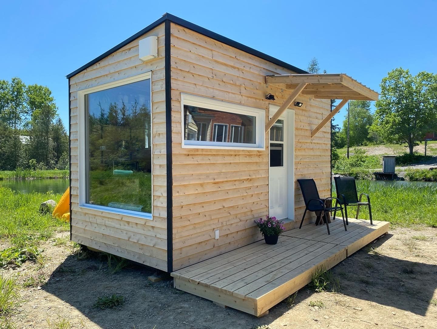 House Exterior from a Tiny Houses project near Gaspésie - Îles-de-la-Madeleine by CAMM Construction