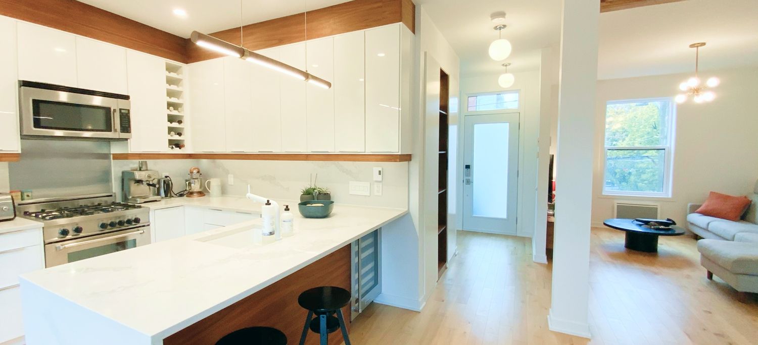 Cocina de un proyecto de tipo Ampliaciones del hogar cerca de Montreal (Gran Montreal) por psb Inc.