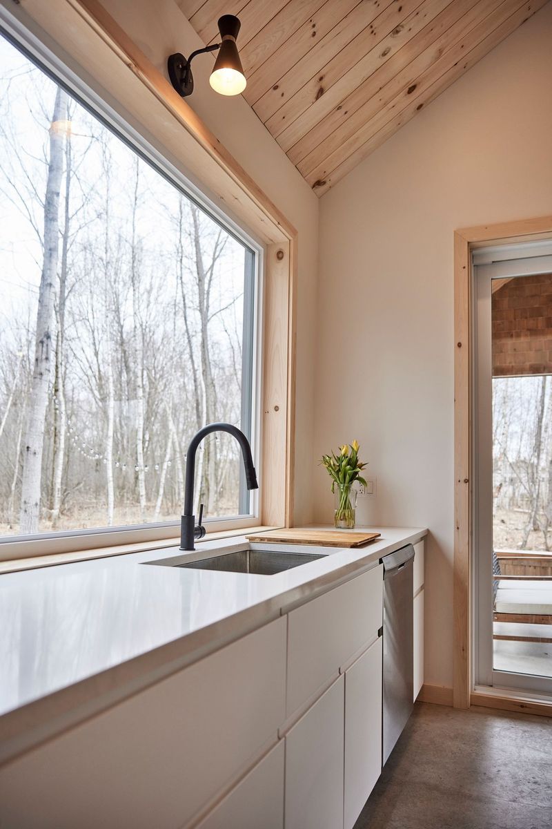 Kitchen from a Single family homes project near Granby - Bromont - Cowansville by Ancré. Architecture & Design