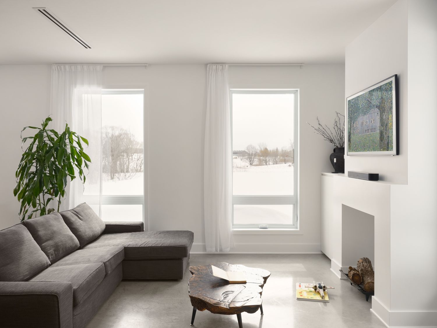 Sala de un proyecto de tipo Viviendas unifamiliares cerca de Montreal (Gran Montreal) por Écorce architecture écologique