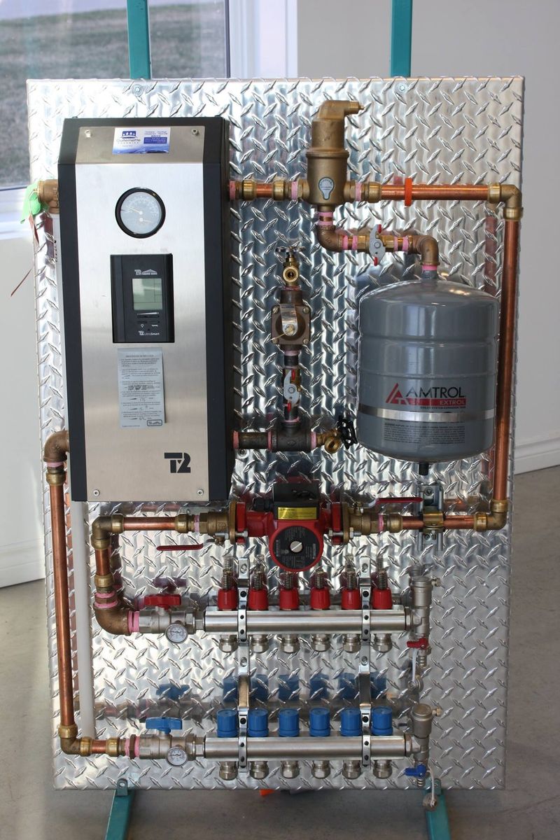 Building mechanicals from a Hydronic Radiant Floor Heating project near Trois-Rivières (Mauricie) by Guillemette Energies